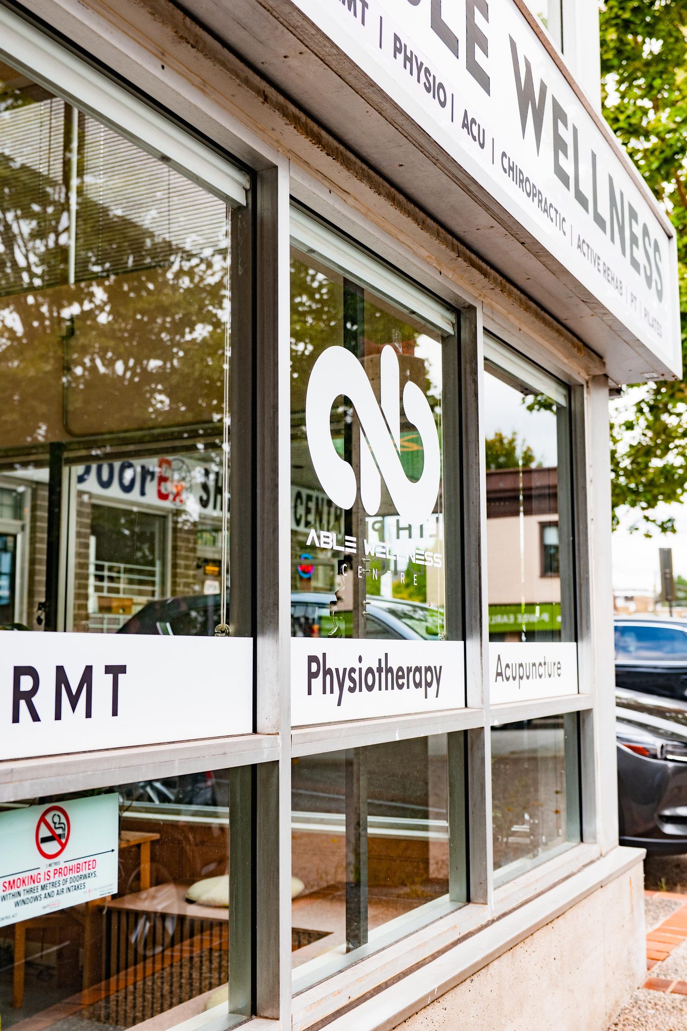 Window lettering listing the clinic disciplines